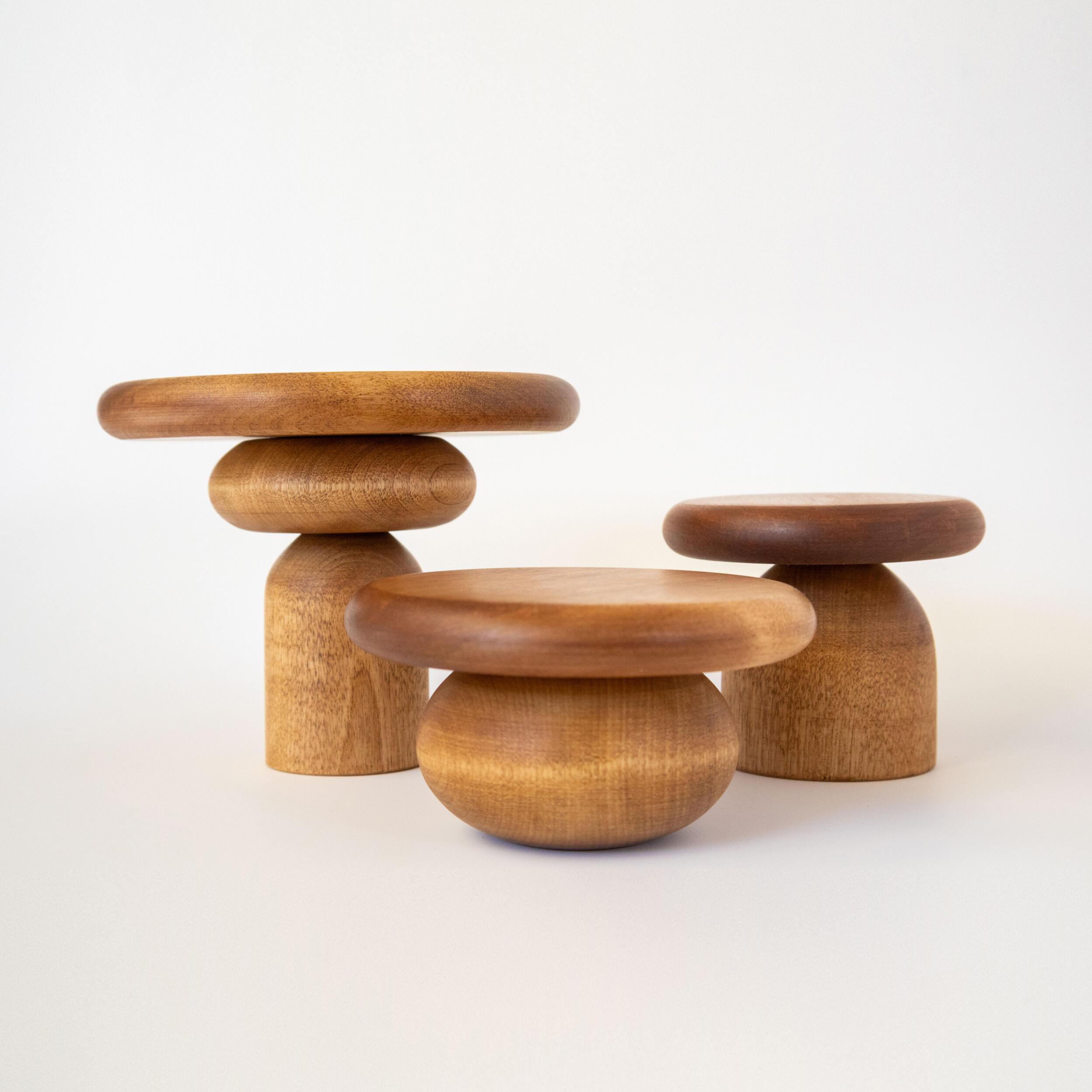 7 piece birch wood display set on a white background