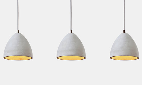 detail of all 3 concrete shades on 3 light pendant