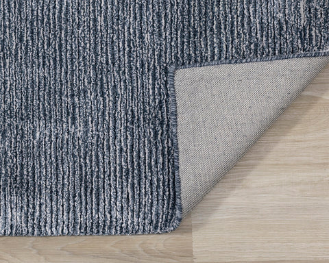 Ashford Handtufted Rug - Blue Grey corner flipped to show under side of rug