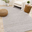 Aspen Woven Rug - Taupe & Black in living room setting