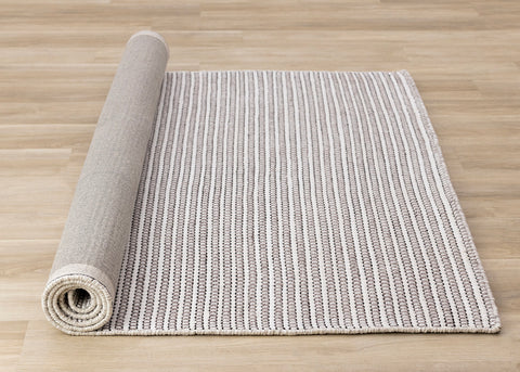 Aspen Woven Rug - Taupe & Black roll on floor