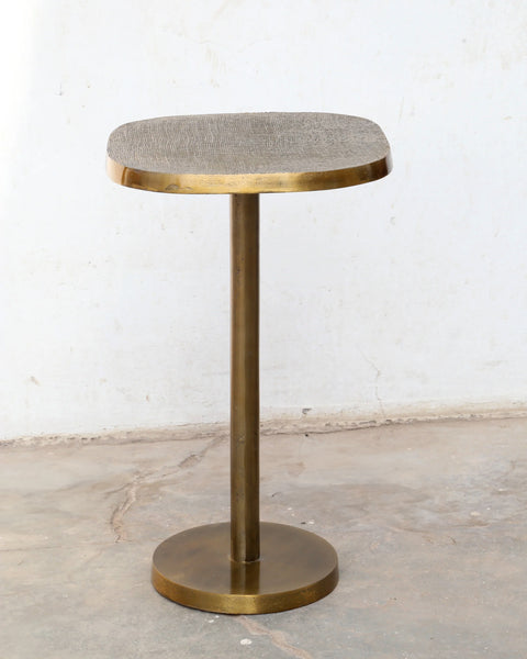 Multipurpose space saving cast aluminum side table in textured brass finish