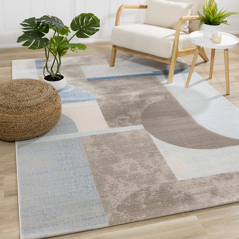 Belle Plush Rug - Blue / Grey Geometric Pattern in living room setting