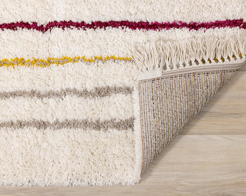 Bora Shag Rug - Double Rainbows corner flipped to show underside