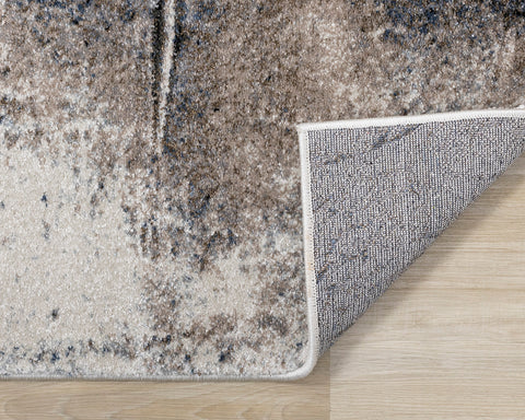 Breeze Rug - Urban Rift corner flipped to show underside