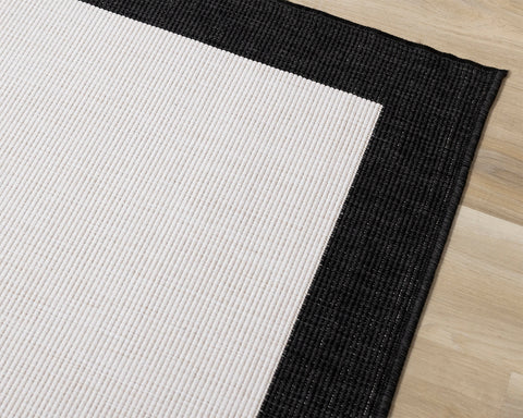 Bristol Reversible Indoor / Outdoor Rug - Cream with Black Border corner