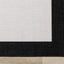 Bristol Reversible Indoor / Outdoor Rug - Cream with Black Border corner detail