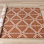 Bristol Reversible Indoor / Outdoor Rug - Rust roll on floor