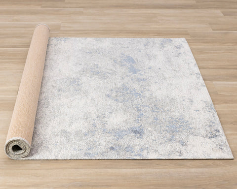 Cathedral Rug - Marbled Blue Grey roll on floor