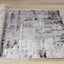 Chorus Distressed Rug - Black & White roll on floor