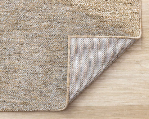 Cora Rug - Taupe Beige Curves corner flipped to show underside