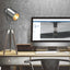  photographer tripod lamp on a wood desk next to a computer and chair