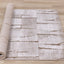 Darcy Corduroy Plush Rug roll on floor