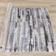 Darcy Rug - Grey / Blue Stripes roll on floor