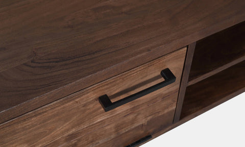 Solid acacia wood media cabinet in charcoal brown finish. Door detail.
