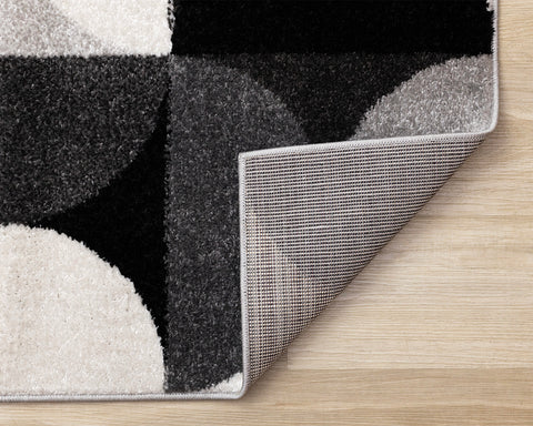 Eclipse Rug - Mid-Century Modern Grey corner flipped to show underside