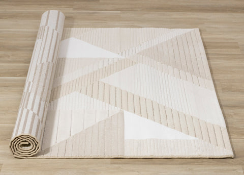 Ella Plush Rug - Cream Geometric roll on floor