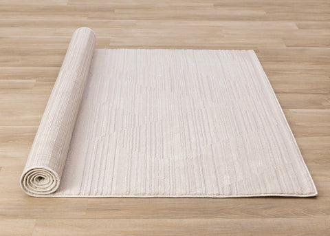 Ellington Rug - Subtle Diamond Pattern roll on floor