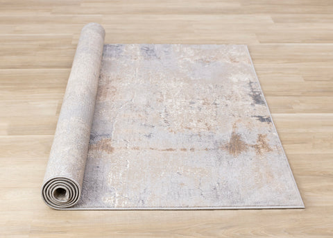 Emory Distressed Rug - Taupe roll on floor