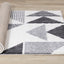 Fergus Shag Rug - Grey Triangles roll on floor