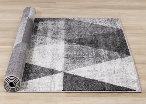 Focus Rug - Grey Faded Triangles roll on floor