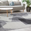 Focus Rug - Grey & White Geometric Shapes in living room setting