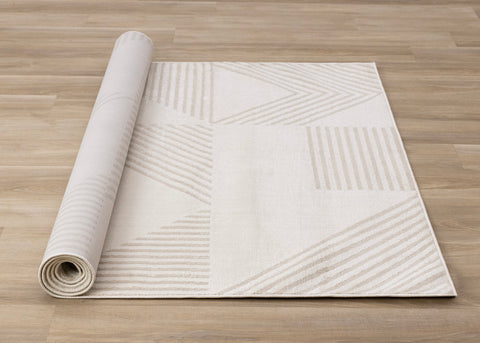 Hayden Rug - Geometric Beige roll on floor