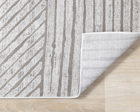 Hayden Rug - Grey Modern Lines corner flipped to show underside of rug