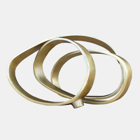 Iron sculpture in gold finish, resembling ribbon intertwined into 3 circles.