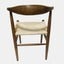 Solid ash wood dining chair with curved back and woven natural cord seat.