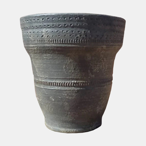 Grey terracotta vase with wide opening.