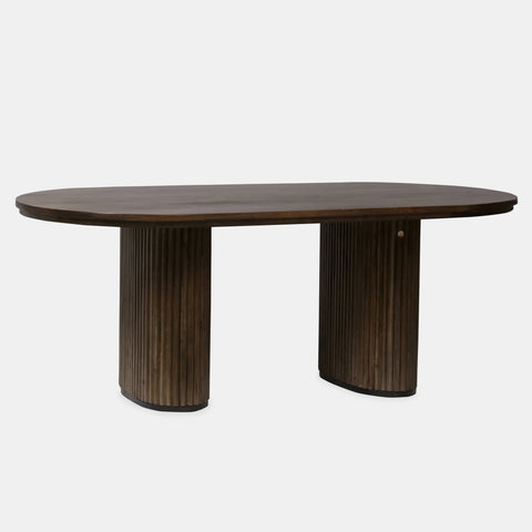 Solid mango wood oblong dining table with 2 repeating pattern ribbed legs in dark olive finish.