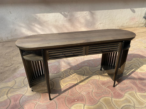  Solid mango wood desk with repeating pattern ribbing on sides in dark olive finish.