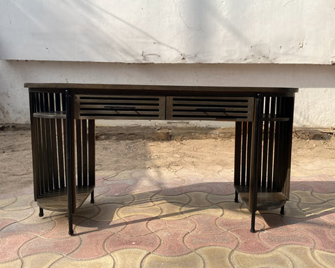  Solid mango wood desk with repeating pattern ribbing on sides in dark olive finish.