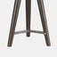  photographer tripod lamp in antique bronze finish with dark brown wood legs. detail of tripod base.