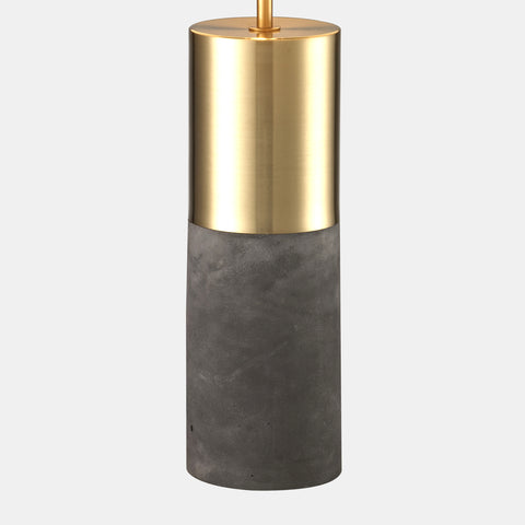 Table lamp with concrete and gold base and black fabric shade. view of base