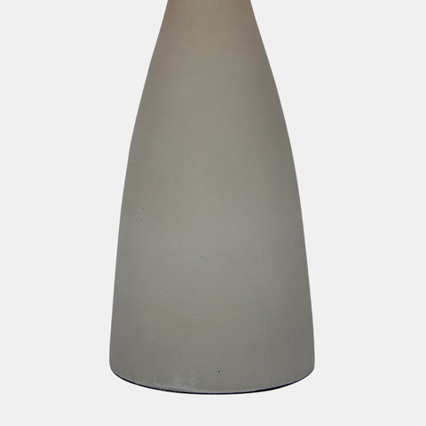 Concrete base table lamp with white linen shade. Concrete base detail.