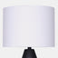 Table lamp with Matte black vase body & white linen drum shade. detail of shade.