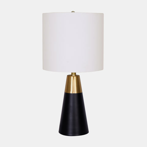 Mid-century modern table lamp with white linen shade and black matte base with gold accent.