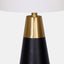 Gold Accent view of mid-century modern table lamp with white linen shade and black matte base with gold accent.