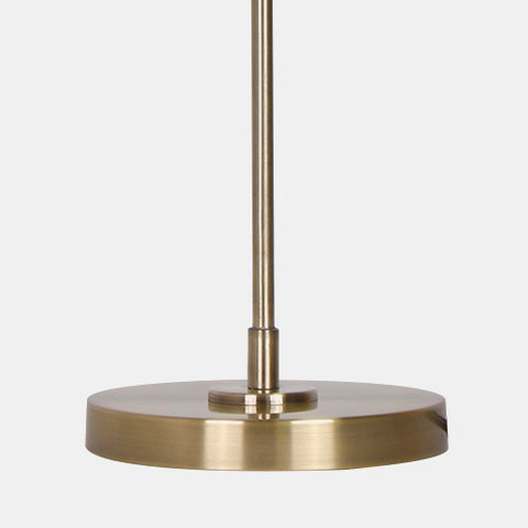 retro inspired table lamp. white linen shade with industrial gold metal arm and base. Detail of Base