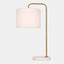retro inspired table lamp. white linen shade with industrial gold metal arm on white marble base.