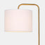 retro inspired table lamp. white linen shade with industrial gold metal arm on white marble base. detail of shade.