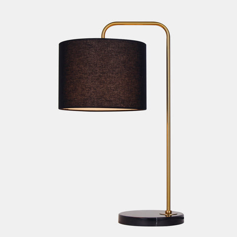 retro inspired table lamp. Brown linen shade with industrial gold metal arm on black marble base.
