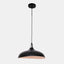 Matte black metal pendant lamp with a black cord and black canopy. close-up of shade