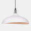 Matte white metal pendant lamp with a black cord and black canopy. close-up of shade