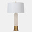 Table lamp with alabaster column body sitting on Industrial gold base & tapered white linen shade.