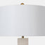Table lamp with alabaster column body sitting on Industrial gold base & tapered white linen shade. Detail of Shade.