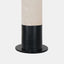 Table lamp with alabaster column body sitting on Matte black metal base & tapered white linen shade. Detail of base.