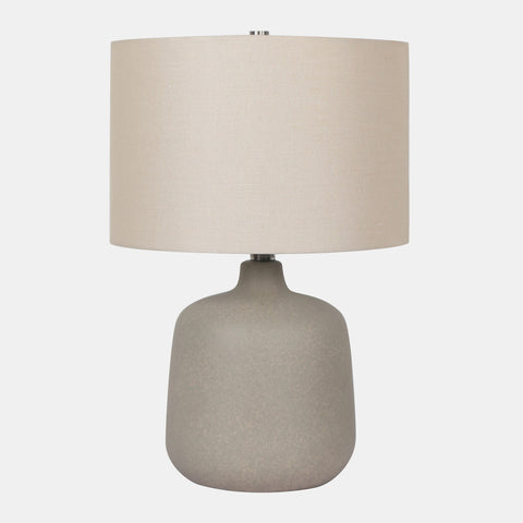 Ceramic Table Lamp with beige drum shade, and warm grey vase-shaped base.